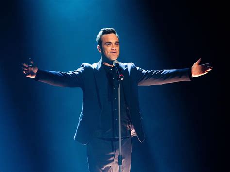 The Robbie Williams Take That Reunion: A Musical Odyssey Marked by Triumph and Tears!